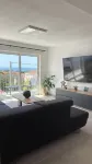 Modern apartment with roof terrace / balcony. Panoramic view of the sea. Hotels in Drage