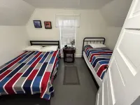 Cozy 2-bedroom cabin in Gilbert. Located close to RockHouse and Devil Anse Trail