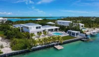 Waterfront Luxury Villa with Optional Boat and Beach Access Just Steps Away