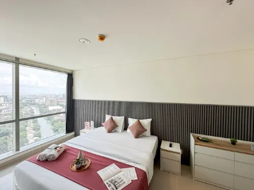 Lovely and Vibrant 2BR Space at Praxis Apartment by Travelio