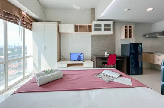 Classic and Compact Studio at The Square Surabaya Apartment by Travelio