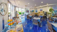 Astro Suite Hotel - breakfast
