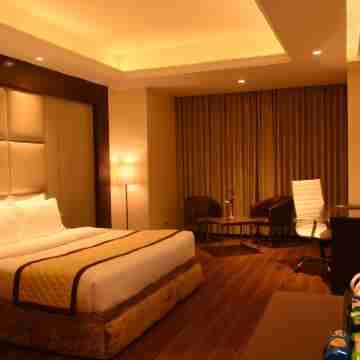 The Gulmohar Grand Hotel Rooms