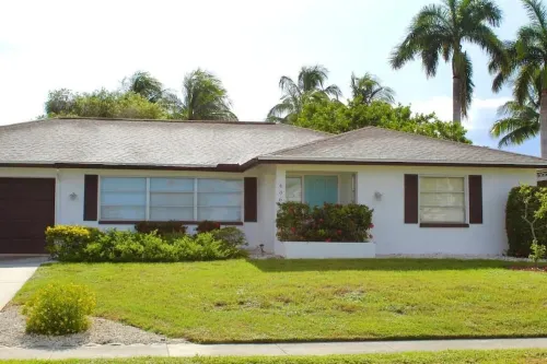 Marco Island Pool Home: Lake and Sunset Views, 2 Bedrooms, 2 Bath . Pet Friendly