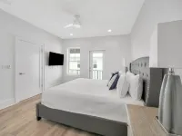 Coastal beach cottage steps away from the white sand beaches!