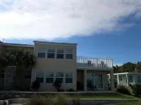 Watch the Sunrise Over the Bay<br>3 minute walk to the beach! - 4-Star