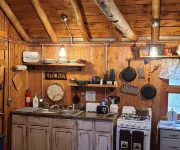 Wood Haven Lodge. Secluded, cozy log cabin in Northern Michigan.