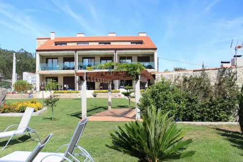 Apartments "As Lagoas" - overlooking the pool and the garden