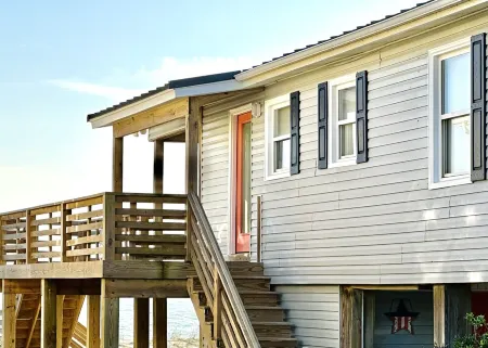 Oceanfront with panoramic views!  Direct beach access from covered deck.