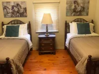 Peaceful Hills Retreat’s cottage is clean and cozy with a creek on 97 acres