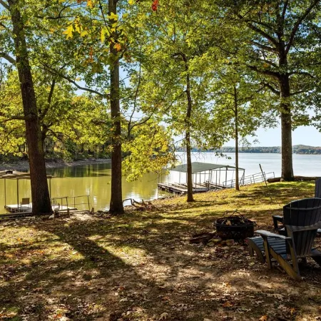 3 bedroom/2 full bath lakefront home with gentle slope to private covered dock
