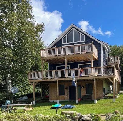 Experience Lakeside Living with a Perfect Blend of Rustic Charm & Modern Luxury