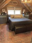 Modern Log Cabin in woods with two gas fireplaces; 20 acres; great location.