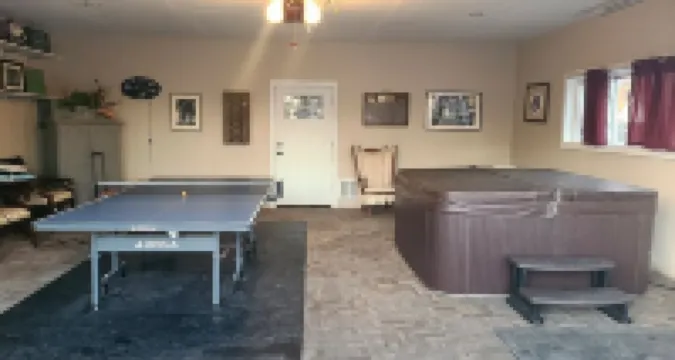 Large Lakehouse with hot tub. walk to public beach in Twin Lakes WI Hotels in Twin Lakes