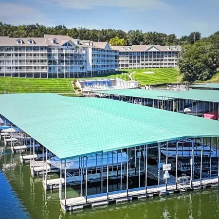 Beautiful lake front condo in perfect location by land and water. Boat Slip.