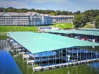Beautiful lake front condo in perfect location by land and water.  Boat Slip. - 4-Star