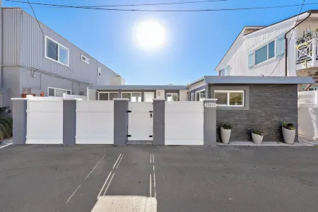 Oceanfront Retreat: 2BR Home with Private Beach Access, Firepit & BBQ