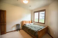Prime Lakefront East Okoboji Condo at Bridges Bay Jet Ski Lift rental available!