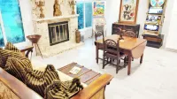 Spacious 5-bedroom Estate Home with a country club back porch pool & waterfall