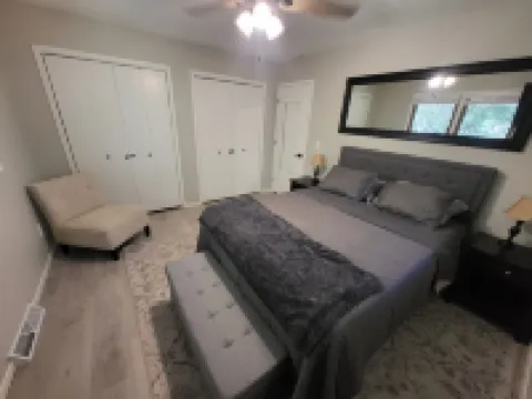 Spacious 4-bedroom house on 1 acre, fenced, GAME ROOM, and party tent rental!