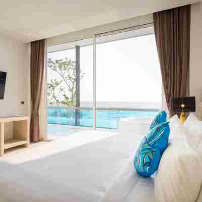 海灘漫步精品度假村 Rooms