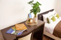 Mr.KINJO VIOLETTE Airport Front