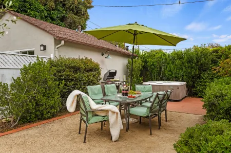 Charming Retreat with Hot Tub and Garden Dining - Spacious Coastal Haven