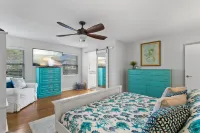 Iconic Front Porch and Timeless Charm - Charming Poolside Oasis