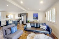 Breezy dog-friendly house with hot tub, central AC, game room, & washer/dryer