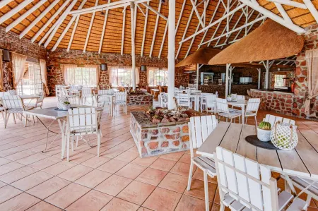 Elegant Desert Lodge Отели в г. Сезрим