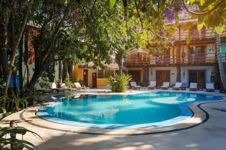 Exe El Pueblito Отели рядом с достопримечательностью «Columpios Casa Punta Cocos»