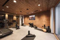 DISTINCTIVE LUXURY DOLOMITI Apartments TERRE71 - gimnasio
