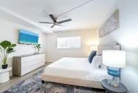 Coastal Escape • Walk to Beach • Gym •  Pool • Hot Tub