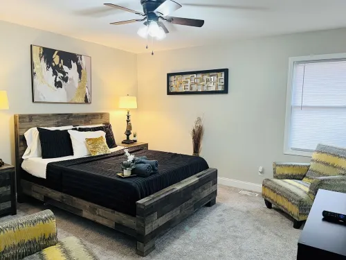 Superb 4BR/Suite NKC Near KC Chiefs, Soccer Stadiums, Airport & Entertainment