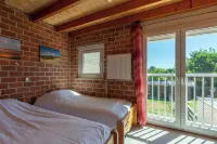 칼란트소그의 홀리데이 홈, 비치 근처