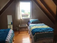 Cozy two story hideaway Hotels in Whangamata
