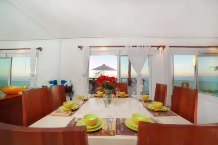 Steps from the beach with private heated pool and incredible views