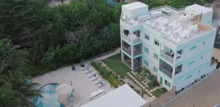 7 Mile Beach Beach Club and Pool Pavilion. Ocean views from Roof Terrace