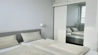 Zweiraumwohnung  im EG in bester Lage, unmittelbar an der Strandpromenade - พร้อมWifi