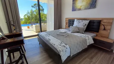 New building above the roofs of Calheta, absolute privacy with a heatable pool
