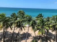 Beachfront Oceanview 2-suite condo with balcony, AC, WiFi, Pool, Fitness Room