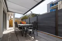 Villa Rosch, WiFi, SKY HD, air-conditioned / ventilation / 4SZ / 2BZ / natural / luxury / Hotels in Norderney