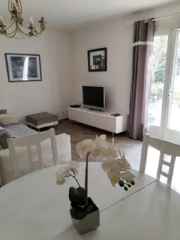 In a forest, in a haven of greenery with private swimming pool.