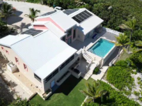 Coral Loft 4BR + 1 BR Oceanfront Villa w/ Private Pool & Beach in Grand Cayman Hotels in North Side
