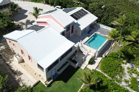 Coral Loft 4BR + 1 BR Oceanfront Villa w/ Private Pool & Beach in Grand Cayman