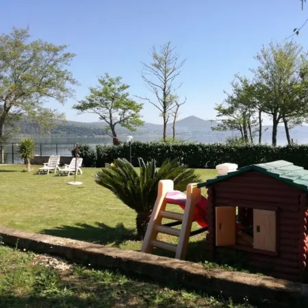 Independent villa with private beach on the lake
