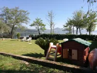 Independent villa with private beach on the lake