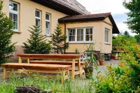 Vacation apartment downstairs in the manor house - Feriendorf Großer Labussee 202