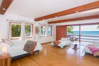 Stay at the famous Jolly Octopus Beach Bar! Beach Front with Water toys included
