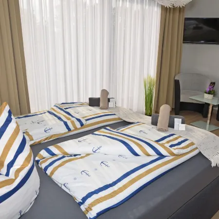 Hotel Neptuns Ankerplatz Отели в г. Куксхафен